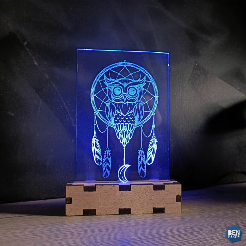 Lampe en verre avec un hibou